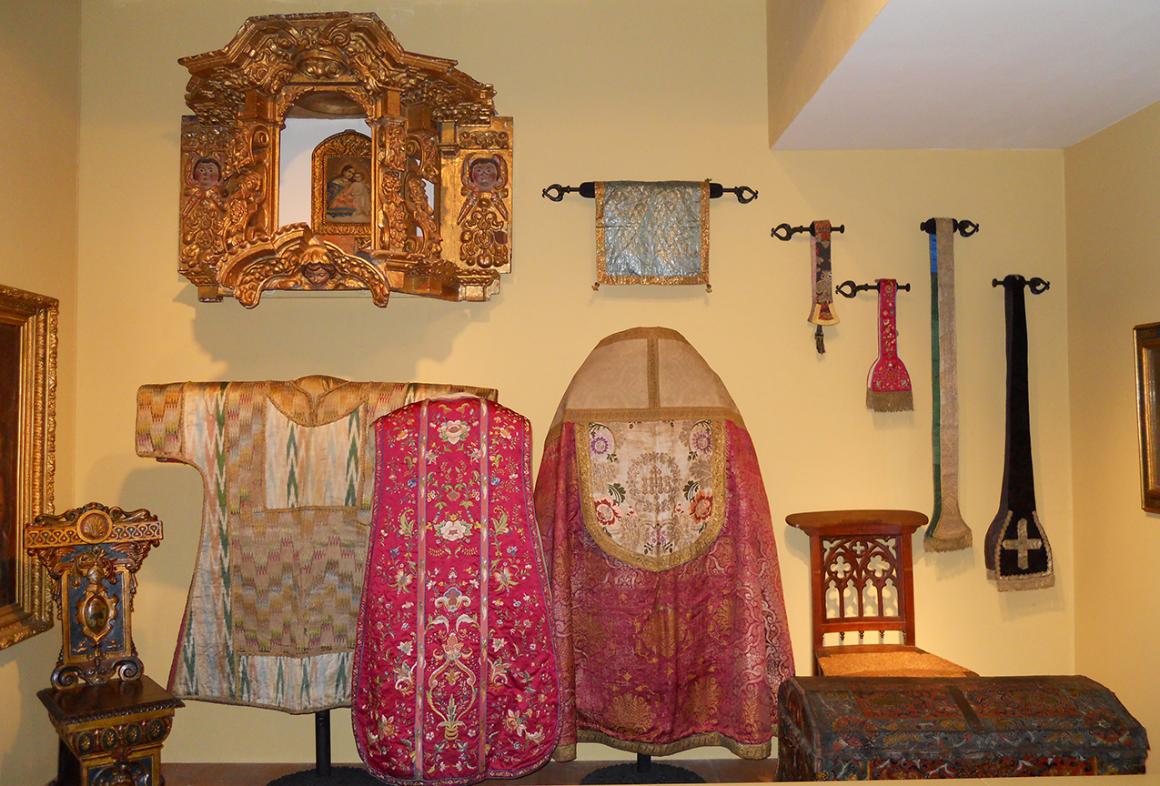 A selection of vestments of different types and patterns from the museum's collection.