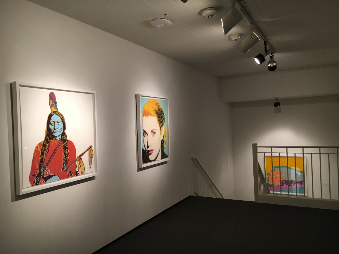 Installation view of three screenprints by Andy Warhol. image link to story