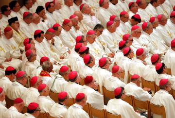 Bishops listen as Archbishop Wilton D. Gregory speaks during a Mass to repent clergy sexual abuse and to pray for molestation victims, Wednesday, June 14, 2017, in Indianapolis. (AP Photo/Darron Cummings)