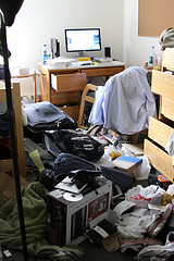 Messy college dorm room image link to story