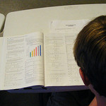 Student reading text book image link to story