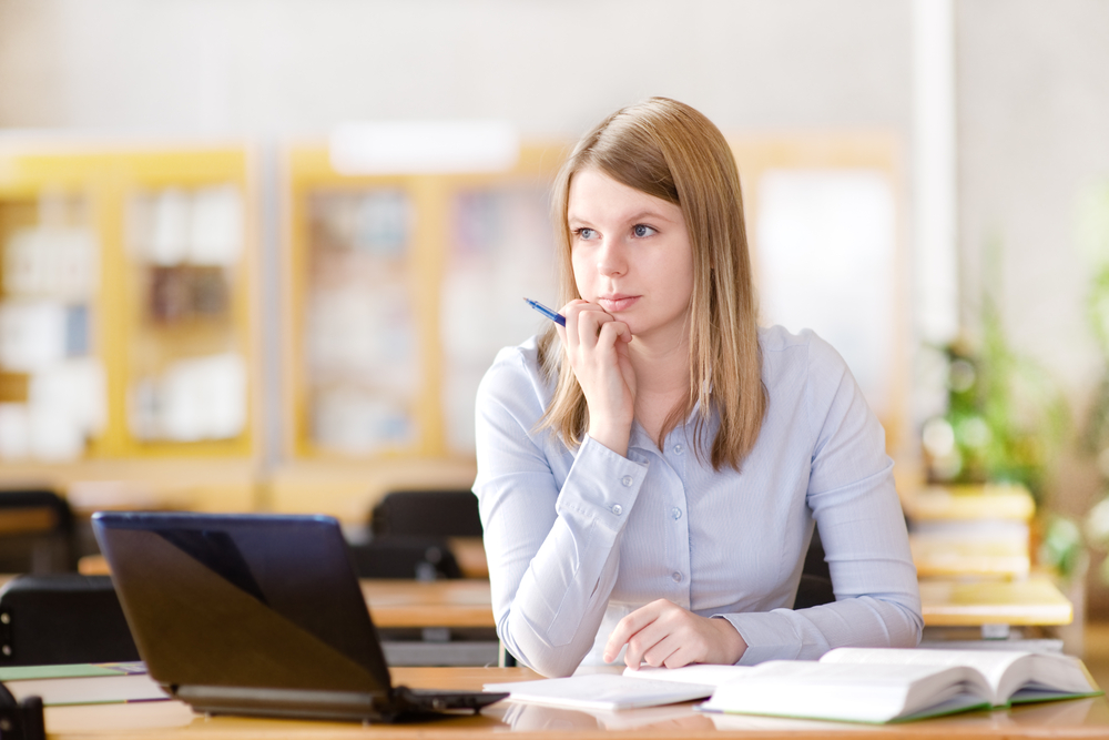 female student studying image link to story