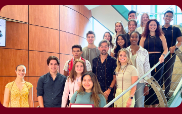 Class of 2023 Seniors from Santa Clara University Ethics Center programs pose for a photo on the atrium stairwell in Vari Hall at a send-off reception in their honor.