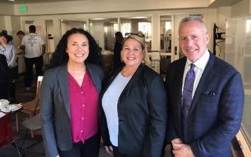 Tristia Bauman, Andrea Urton, and Sacramento Mayor Darrell Steinberg stand together.