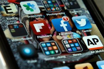 Social media apps. (AP Photo/Evan Vucci, File) image link to story
