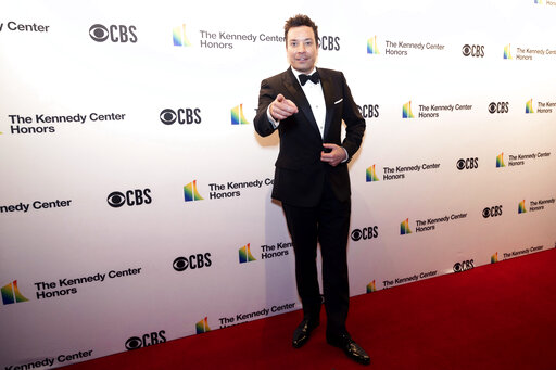 Jimmy Fallon poses on the red carpet at the honors gala for the 44th Kennedy Center Honors on Sunday, Dec. 5, 2021, in Washington. (Kevin Wolf/AP Photo) image link to story