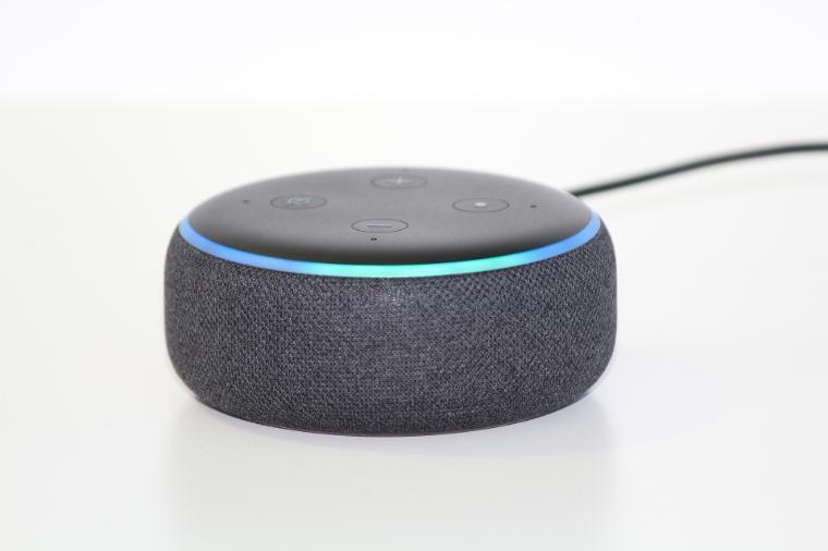 A blue and gray Amazon Echodot. image link to story