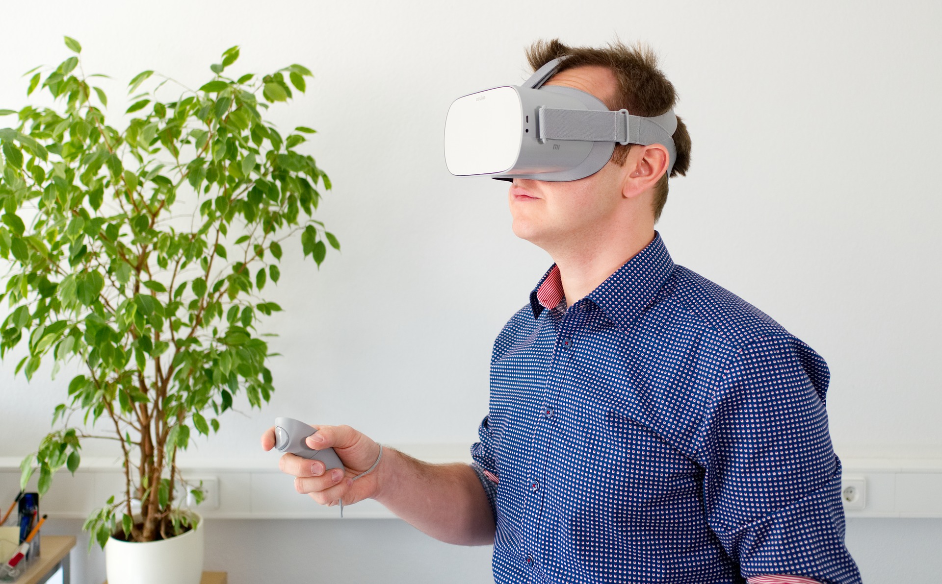 man wearing a VR headset image link to story