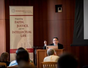 Two people giving a lecture at the Bannan Institute.