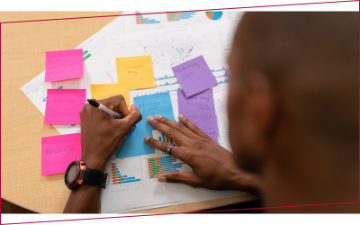 Student studying with bright colored note cards