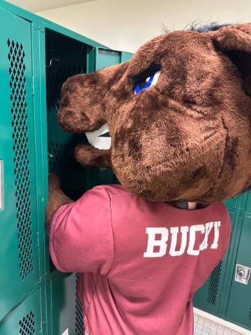 Image of Bucky the Bronco SCU Mascot using a locker