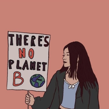 person holding sign that says there is no planet B