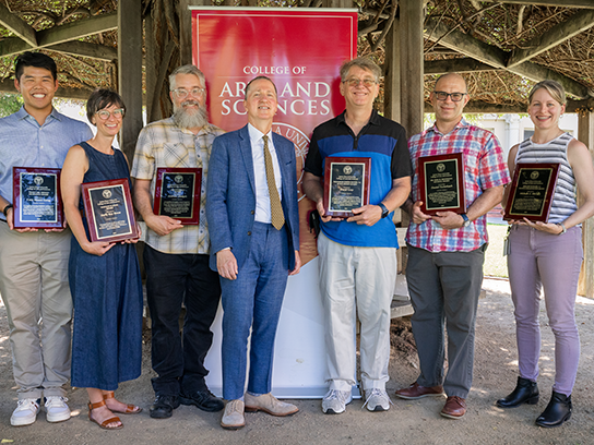 Daniel Press and six of the nine 2025 CAS award winners
