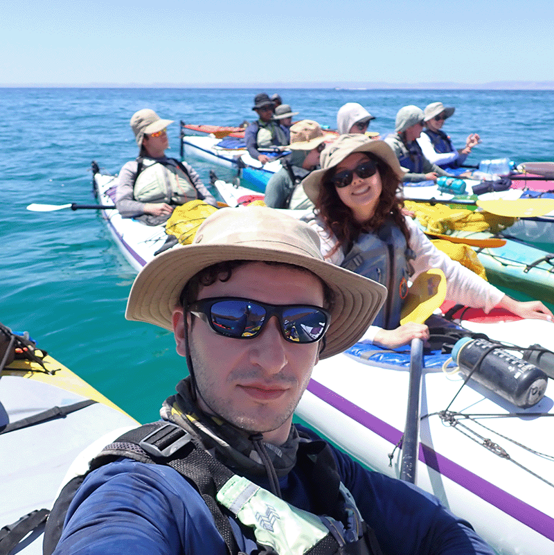 Max Johnston '24 and fellow Bajarinos, including Stephanie Davis '25, kayaking in the Sea of Cortez