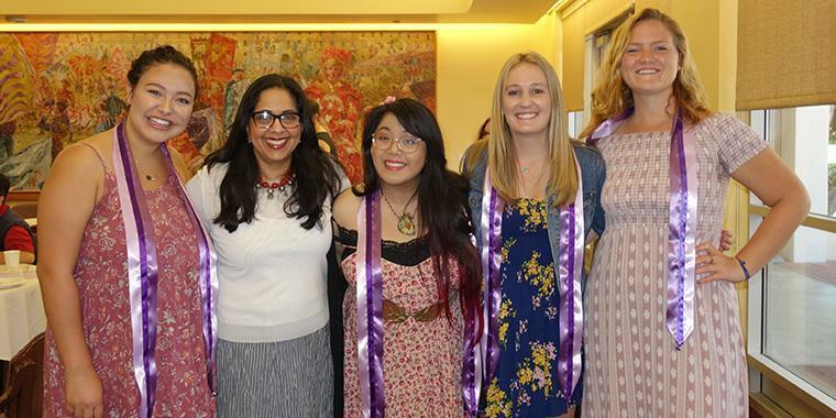 Professor Lodhia with graduating seniors 