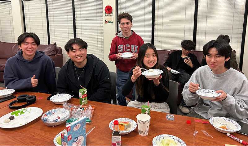 Students enjoying Chinese food in celebration of the 2024 Lunar New Year
