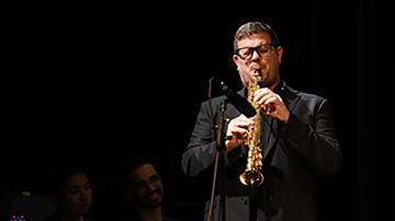 Carl Shultz playing saxaphone