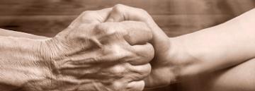 two hands clasped together