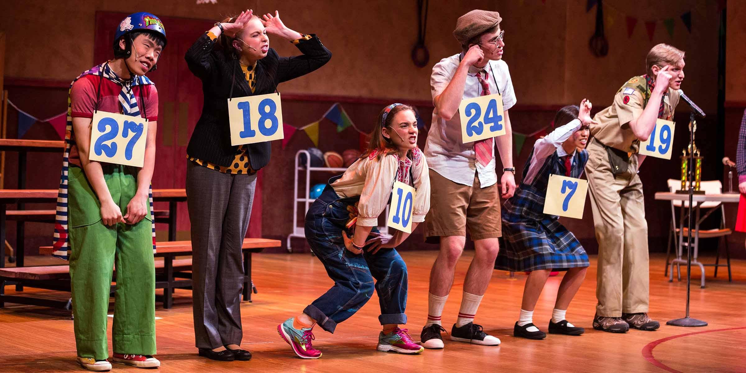 Characters of the spelling bee on stage 