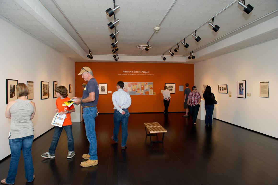 View of visitors in museum galleries.