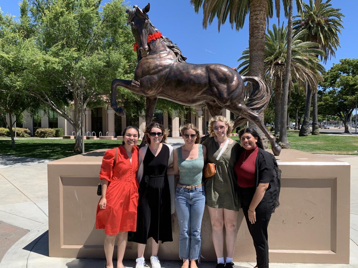 students standing in front of Bronco 