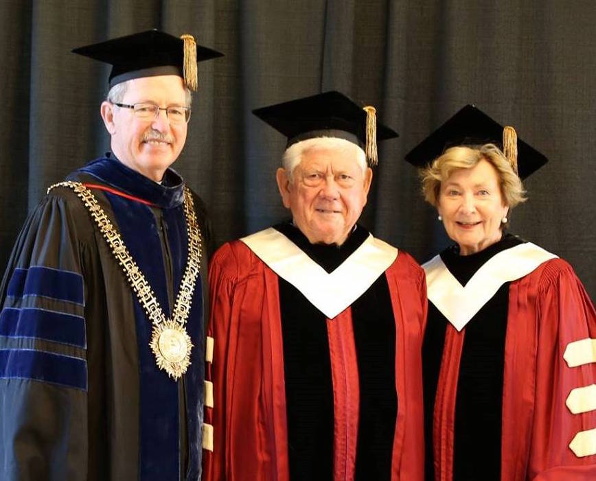University President Michael Engh, S.J., with Mike and Mary Ellen Fox image link to story
