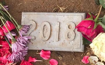 Gravestone for the year 2018 under or nearby which the cremated remains of 1,780 persons who died unclaimed are buried in Evergreen Cemetery in Boyle Heights.  Photo by David DeCosse image link to story