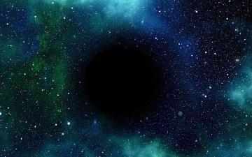 A black hole in a vast view of outer space. Photo by Gerd Altmann via Pixabay. 