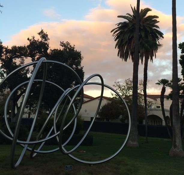 Sculpture and palm tree on SCU campus