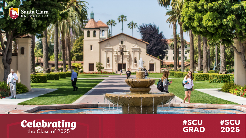 A water fountain in focus with the Mission Church in the background and a red banner that says Celebrating the Class of 2025