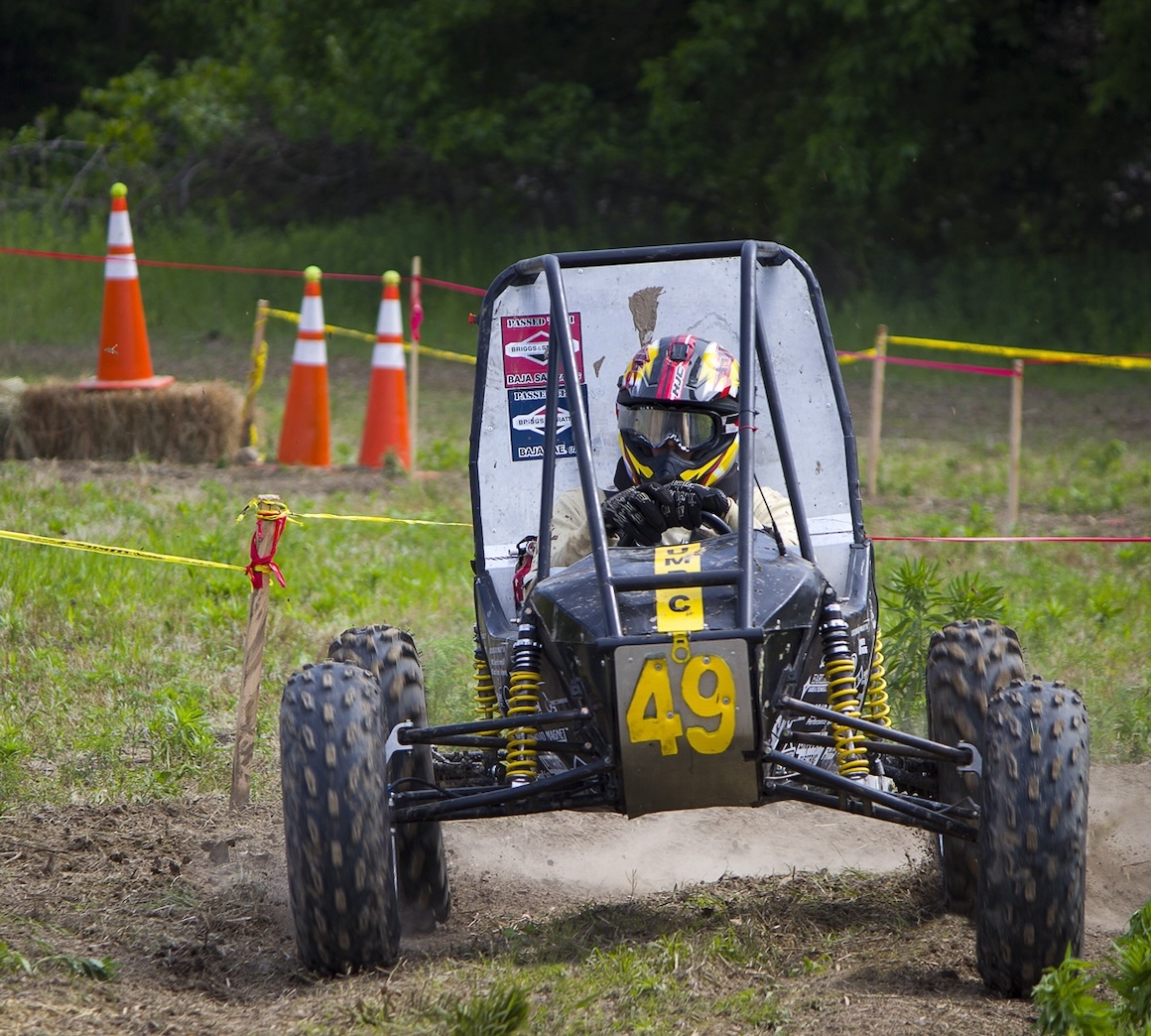 A mini-Baja SAE vehicle with race driver