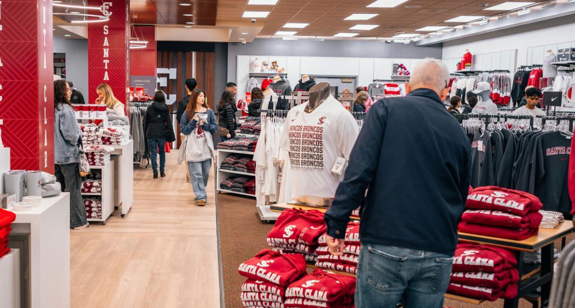 Students and parents browsing SCU gear at the Bronco Bookstore 