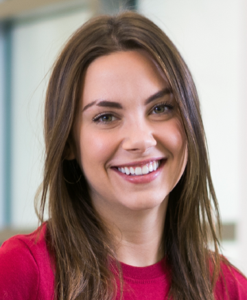 A woman smiling in a professional headshot.