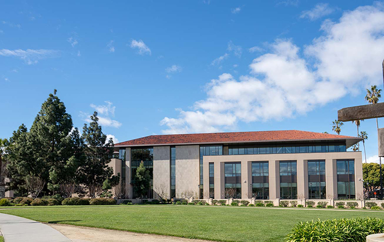 Charney Hall viewed from entrance of campus
