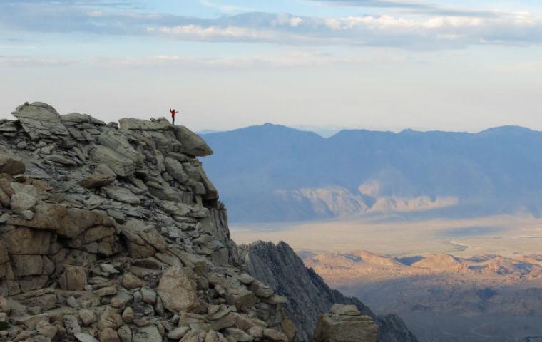 Fulbright Winner Sean Reilly atop East Sierra mountain image link to story