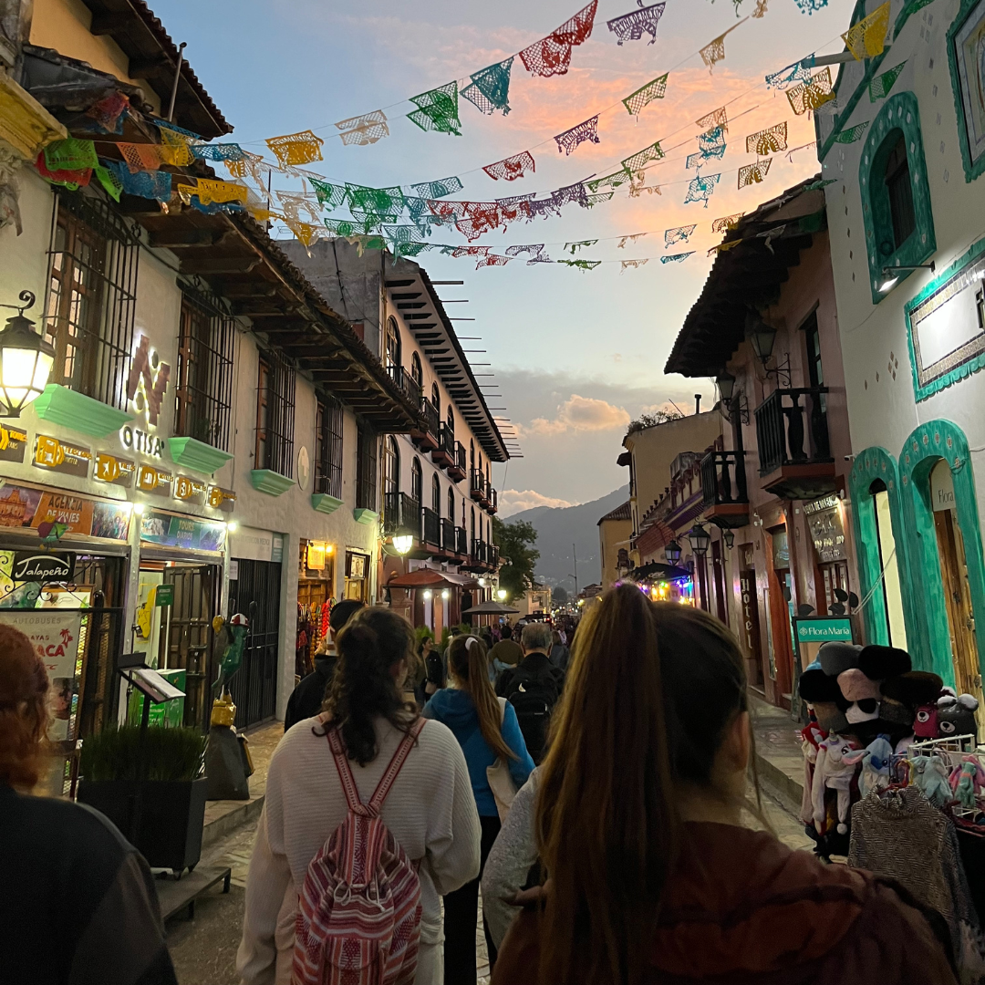 students walking through the streets of a location where they attended an immersion put on by the Ignatian Center 