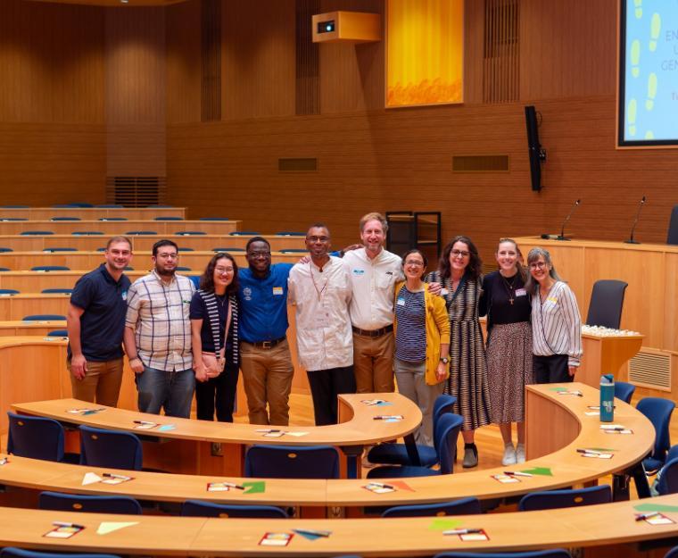 JST-SCU delegation and Dean Orobator at the Jesuit Curia. Photo courtesy of Vivian Richard, S.J. People smiling at camera at the Jesuit Curia