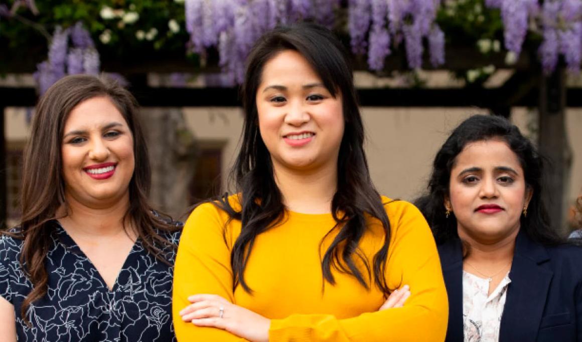 Three Leavey School of Business graduate students in the Mission Gardens