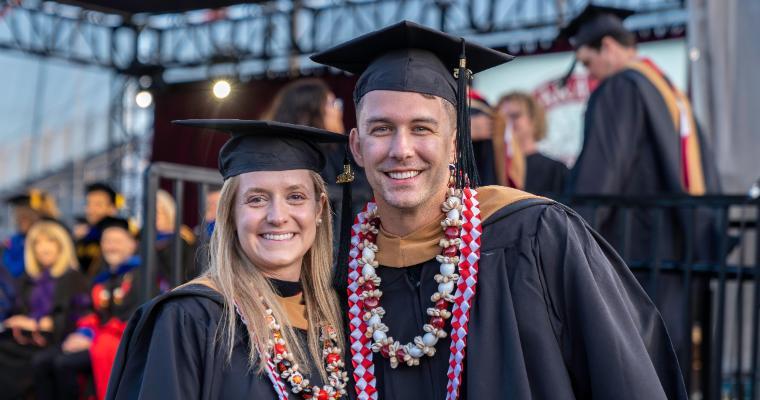 Leavey MBA graduates celebrating their accomplishment at commencement.