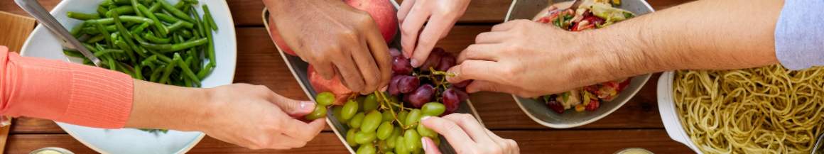 Mosaic Dinner Banner - hands reaching for food at table
