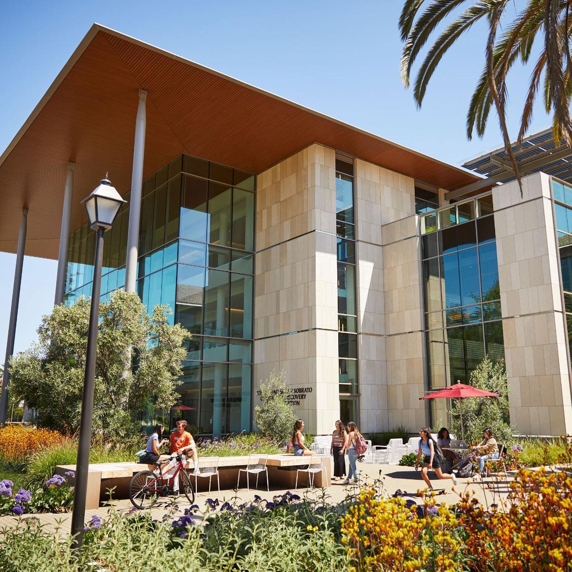 Students hanging out in front of the SCDI building.