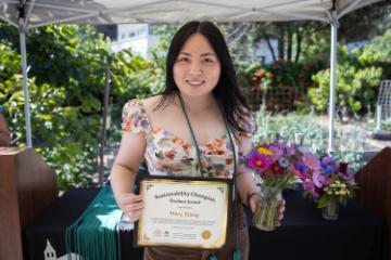 2025 Sustainability Celebration: A student poses with her award.