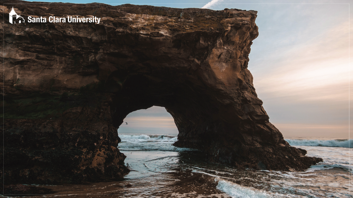 rock arch formation from a nearby beach in Santa Cruz