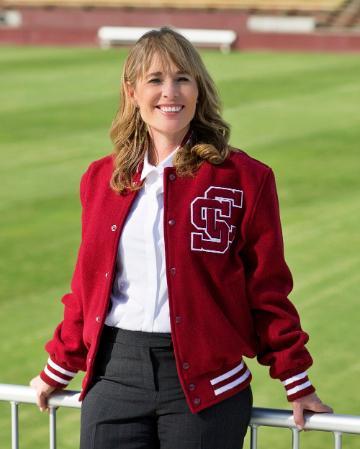 A woman in a red Santa Clara University letterman's jacket