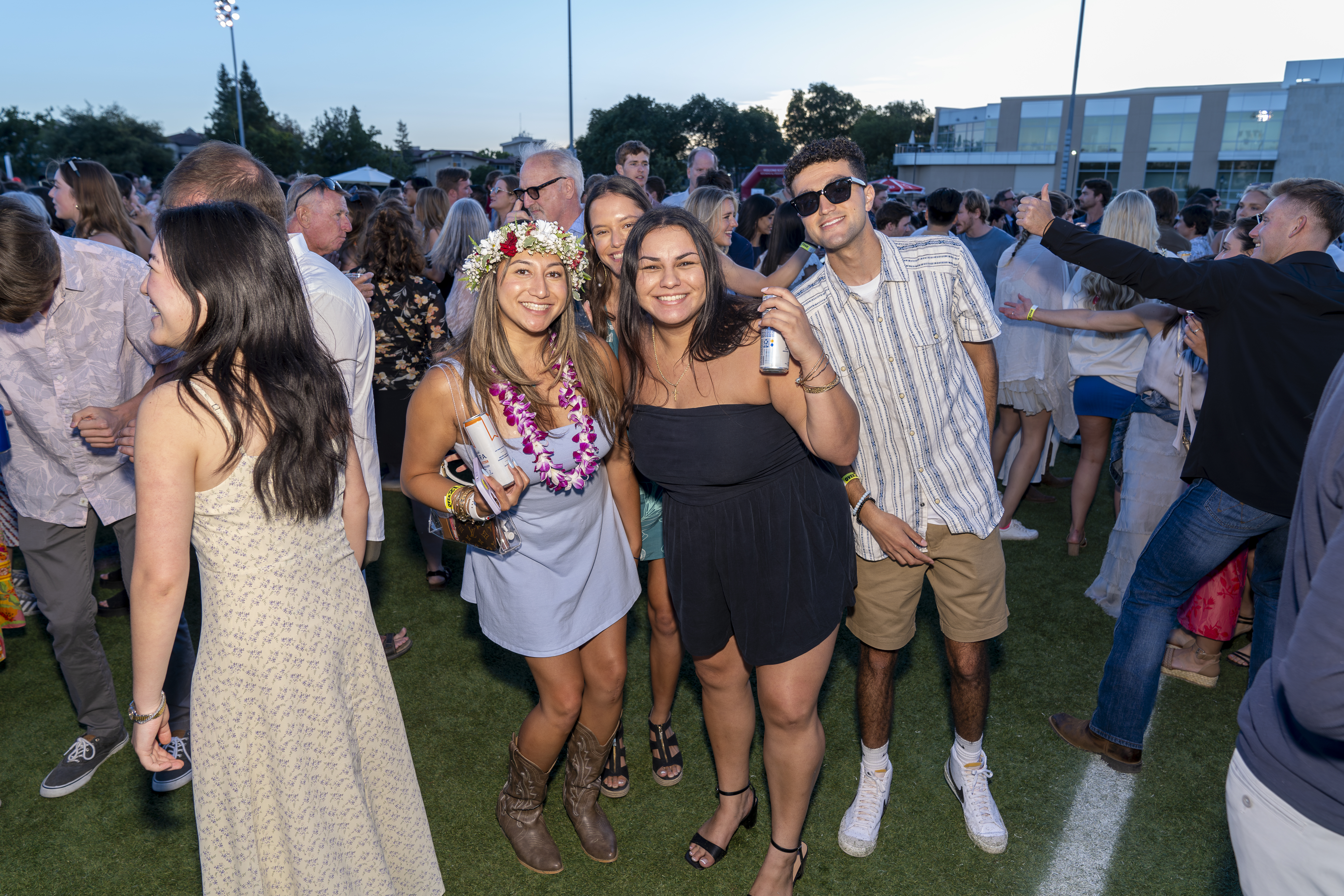 Friends dancing photo at Grad Bash 2024