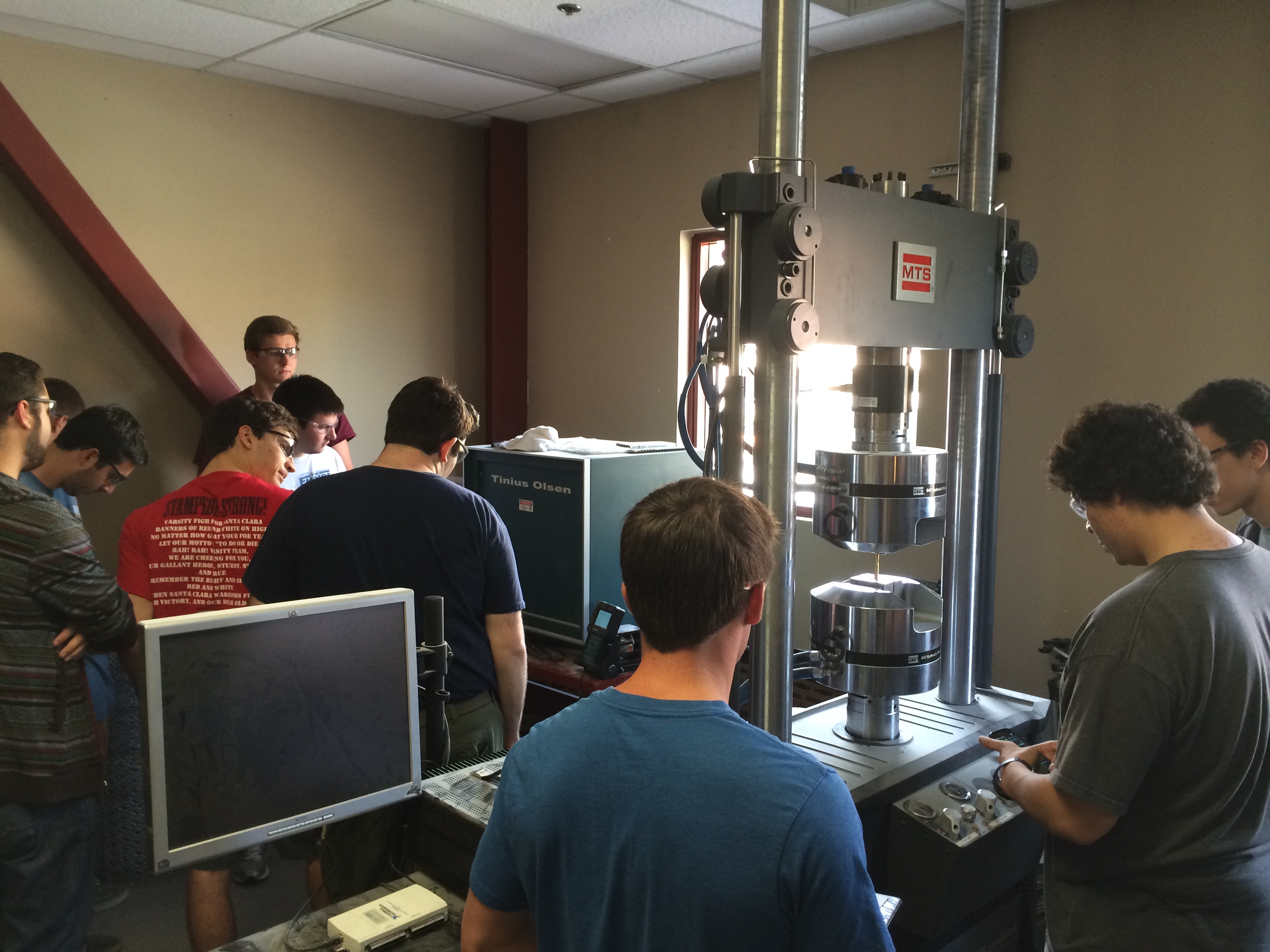 10 students conducting the tension and torsion lab for CENG 43