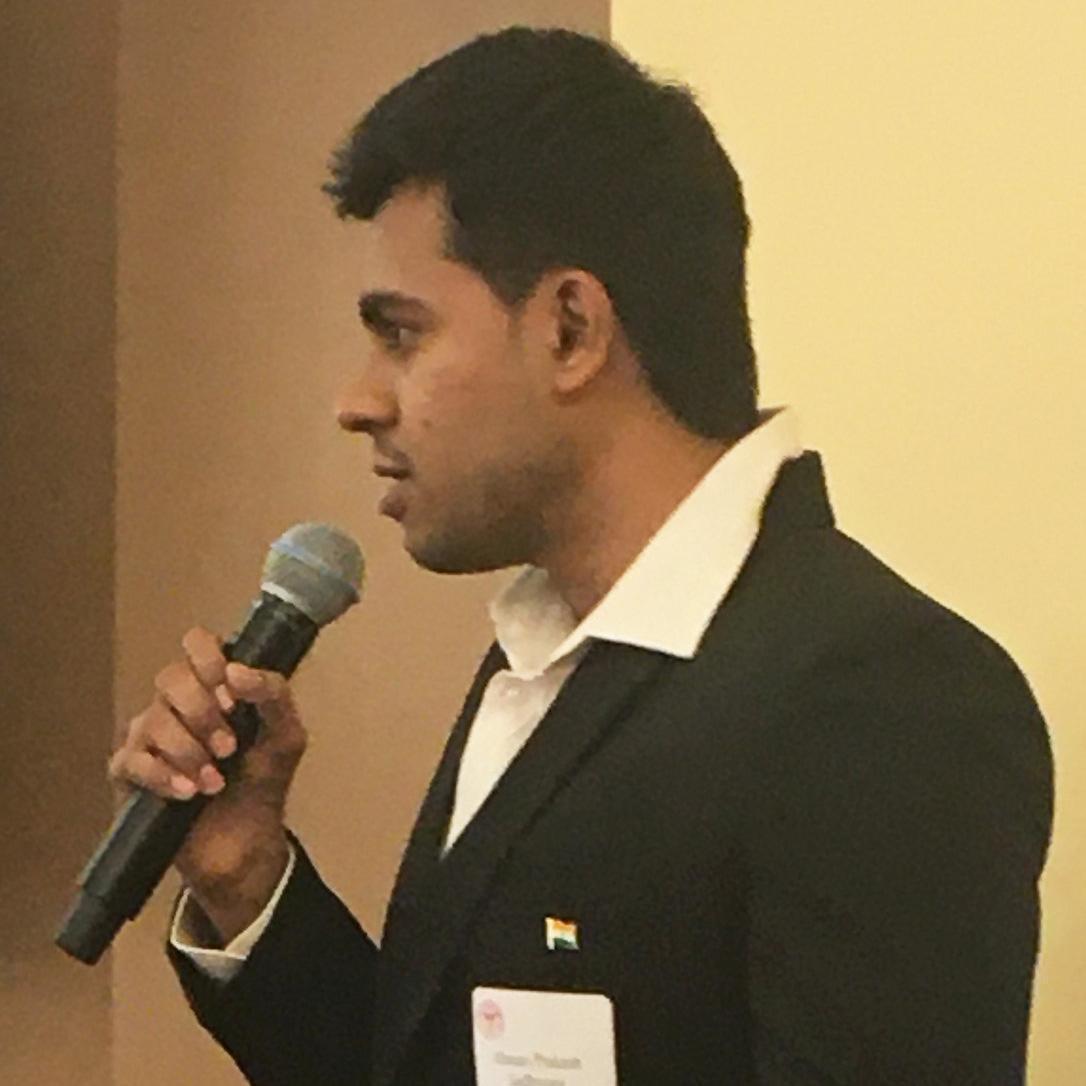 Manas Prakash Sadhwani talking into a microphone  image link to story