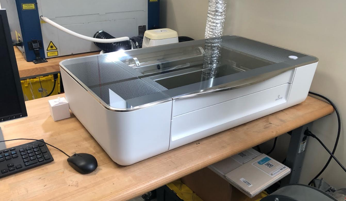 Glowforge laser cutter on a table