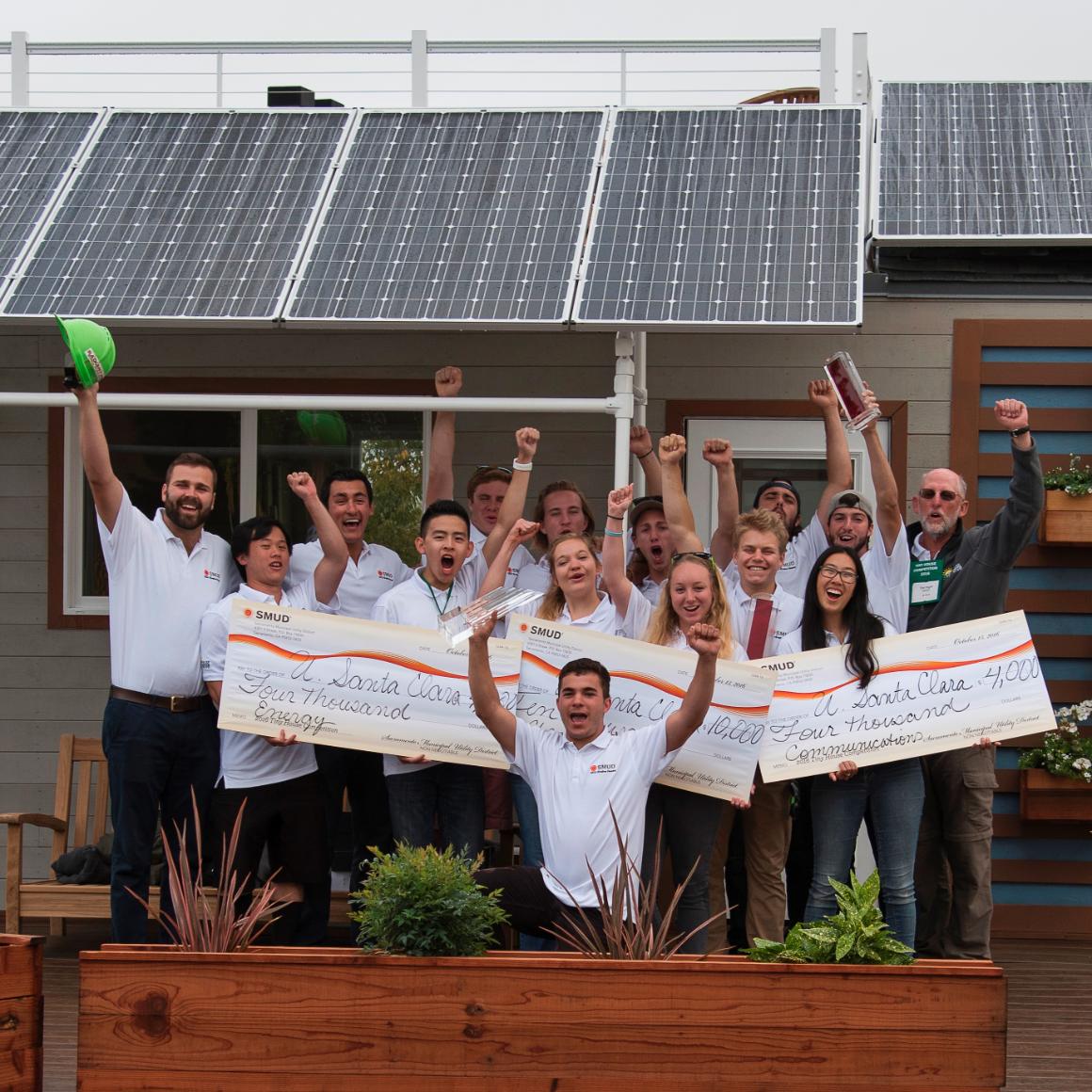 SCU's 2016 Tiny House team celebrates their victory in front of rEvolve House